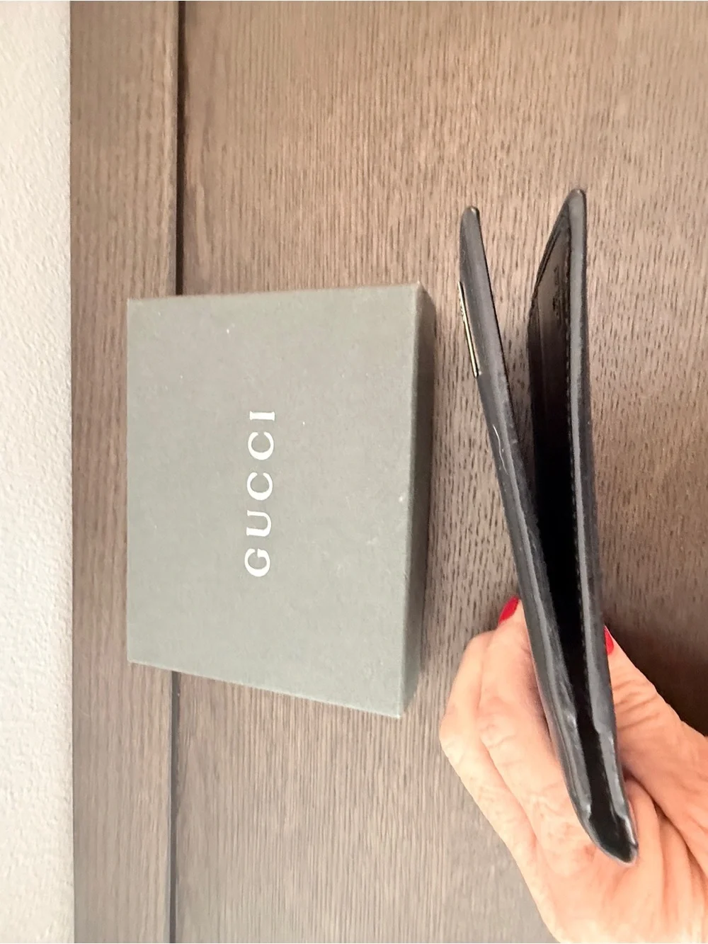 Gucci Black Smooth Leather Bifold Wallet with Metal Plaque